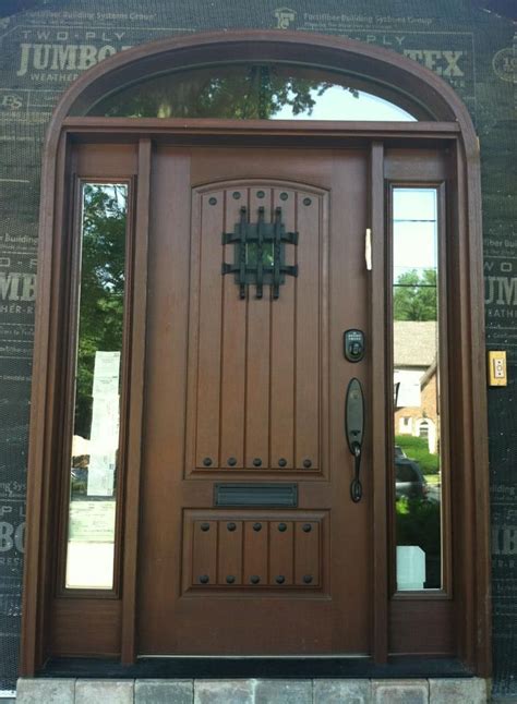 Grand Entrance Clopay Rustic Collection Stained Cherry Fiberglass Entry Door With Decorative