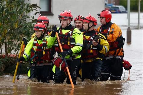 family trapped  flooded home  brechin  emergency services unable