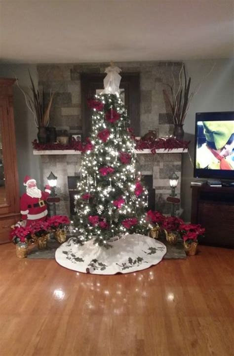 A Decorated Christmas Tree In A Living Room