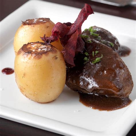 Braised Pork Cheeks With Confit Potatoes Recipe Delicious Magazine