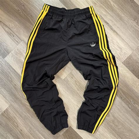 BLACK YELLOW ADIDAS TRACK PANTS STRIPPED VINTAGE... - Depop