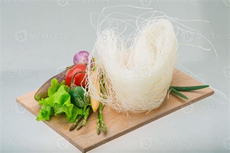 Raw rice noodles 10909824 Stock Photo at Vecteezy