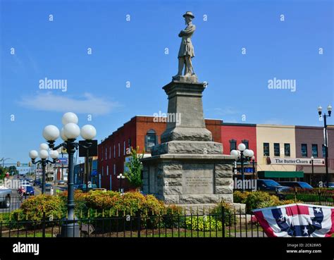 Statue Of Confederate General Hatton Arms Crossed With Sword On Stone Plinth On The Town Square