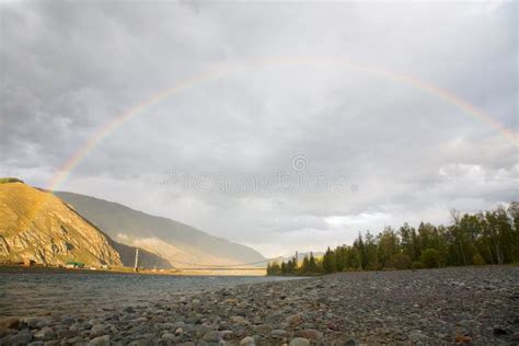 Rainbow Over the Mountain River Stock Image - Image of rainbow ...