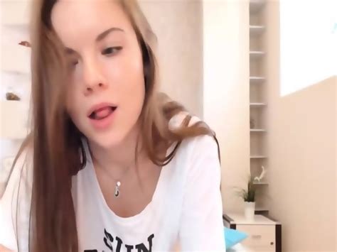 Brunette Babe Seductively Peels Her Body