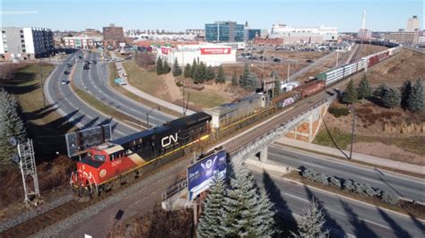 Awesome 4K Aerial View Manifest Train CN 507 Rolling Thru Moncton NB