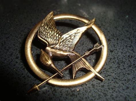 Items similar to Hunger Games Inspired Katniss Everdeen Mockingjay Pin on Etsy