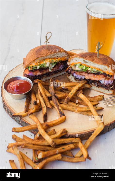 Vegan Burger, Fries and a Beer Stock Photo - Alamy