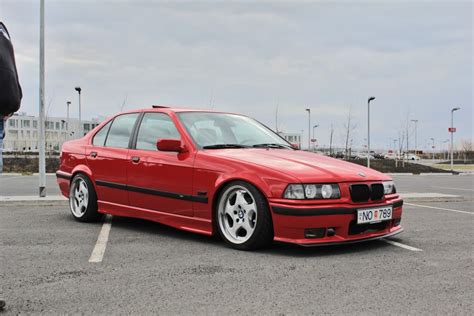 Hellrot Bmw E36 Sedan On Oem Bmw Styling 21 Throwing Star Wheels