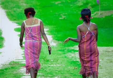 Premium Photo Two Women Wearing Papuan Traditional Clothes