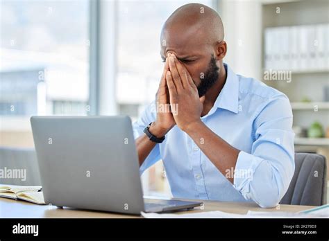 Stress Anxiety And Tired Businessman With A Laptop Suffering From Burnout While Frustrated