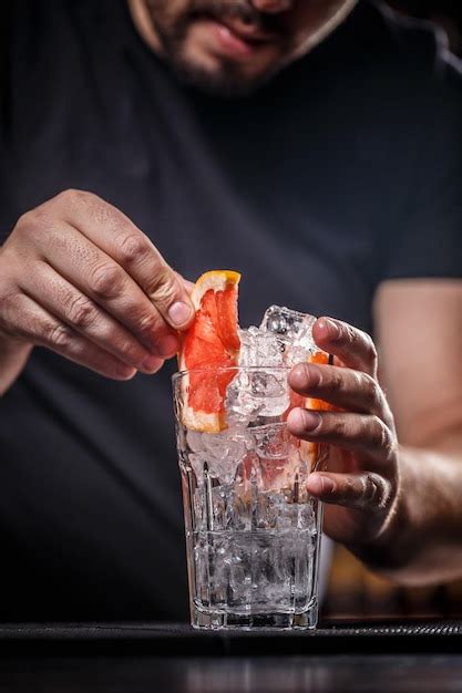 Premium Photo Barman Is Making Cocktail