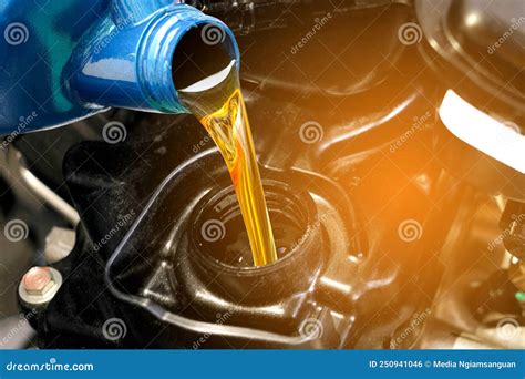 Refueling And Pouring Oil Quality Into The Engine Motor Car