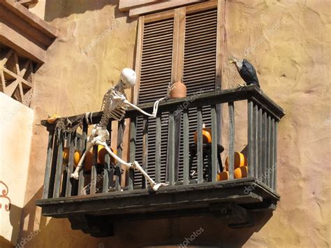 Skeleton Climbing A Balcony With A Vulture — Stock Photo © James633