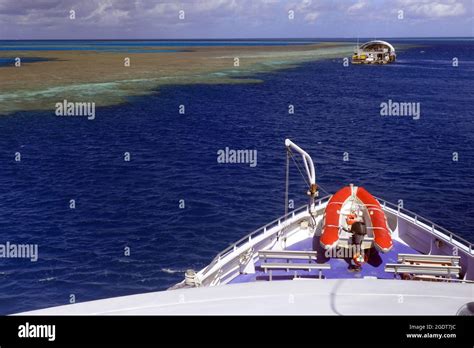 Reef Tourism Vessel Approaching Pontoon At Hardy Reef Whitsundays