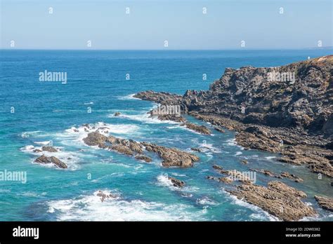 Rough Seascape With Rocks And Waves Stock Photo Alamy