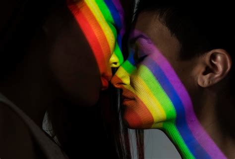 Free Photo Men Holding Hands With Pride Symbol