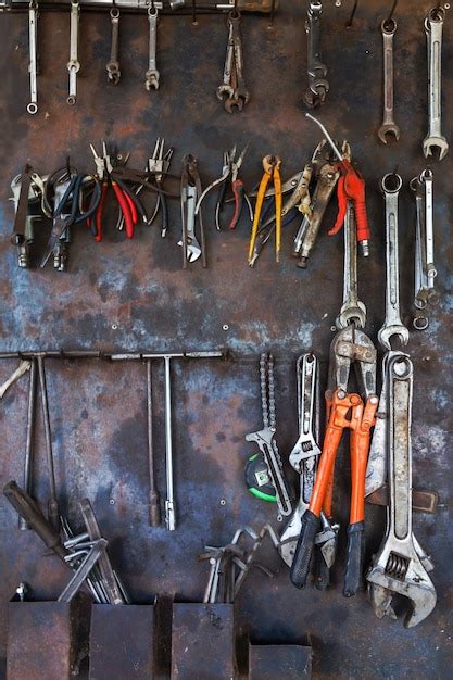 Premium Photo Tools Hanging At Workshop