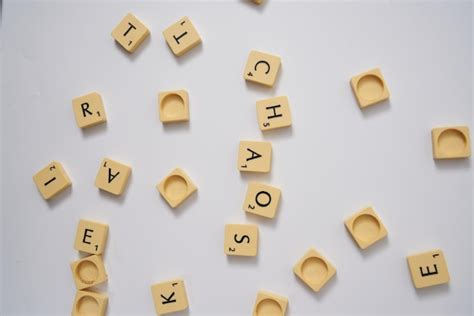 Premium Photo Chaos Written With Scrabble Alphabet On A White Background