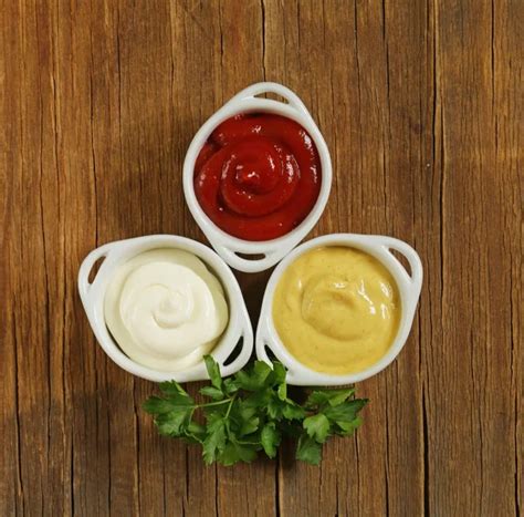 Mustard Ketchup And Mayonnaise Three Kinds Of Sauces Stock Photo By