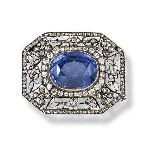 A Russian Sapphire And Diamond Brooch The Oval Shaped Sapphire Is Set