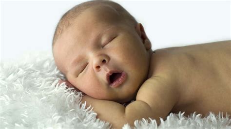 Download Sleeping Newborn Baby Wallpaper