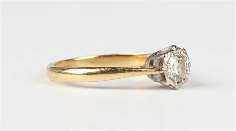 An Ct Gold And Diamond Single Stone Ring Mounted With A Circular Cut