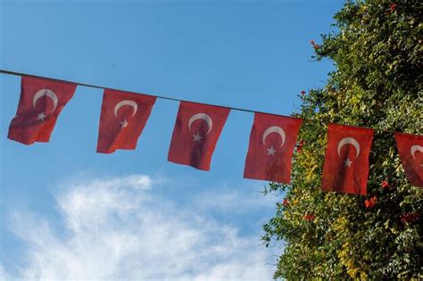 Premium Photo Turkish National Flags With White Star And Moon In Sky