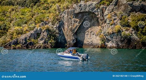 Tourist Boat With Tourists Watching Traditional Rock Carving Lake Taupo