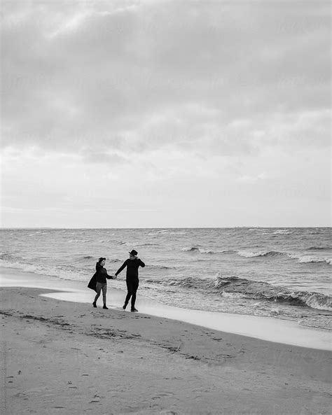 Couple Walking On Beach