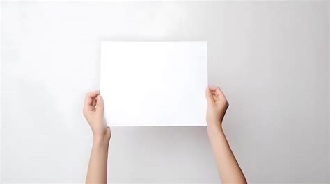 Premium Ai Image A Person Holding A Blank Sheet Of Paper