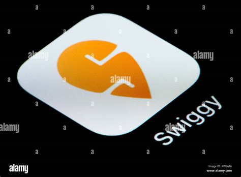 A Close Up Shot Of The Swiggy App Icon As Seen On The Screen Of A