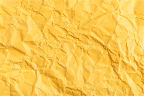 background from yellow crumpled paper 12575723 Stock Photo at Vecteezy