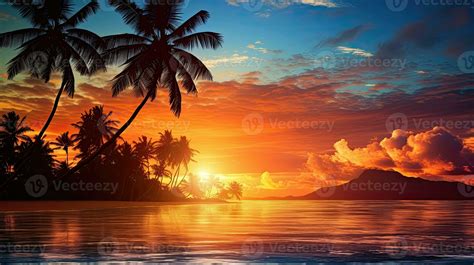 Vibrant Tropical Island Sunset With A Golden Reflection On The Ocean