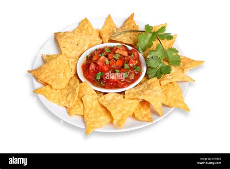 Platter Of Tortilla Chips And Salsa Cut Out On White Background Stock