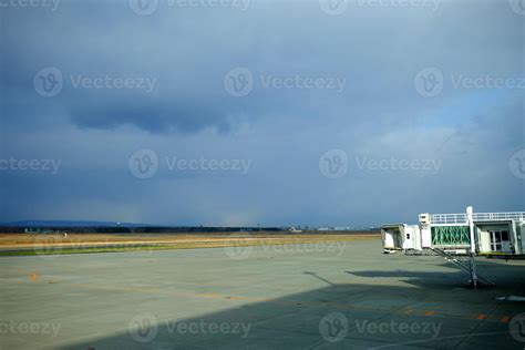 Jet Bridge at New Chitose Airport Hokkaido, Japan in Cloudy Day