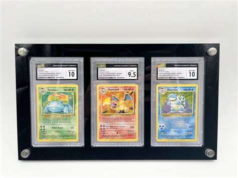 The Pok Mon Company Graded Card Venusaur Holo Blastoise Holo