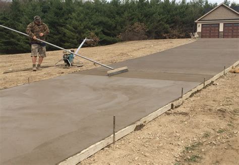 Colored Concrete Driveway and Stamped Concrete Sidewalk