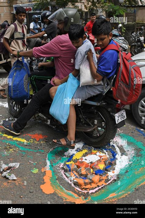 Mumbai India 26th Sep 2022 A Motorcyclist Rides Past A Pothole