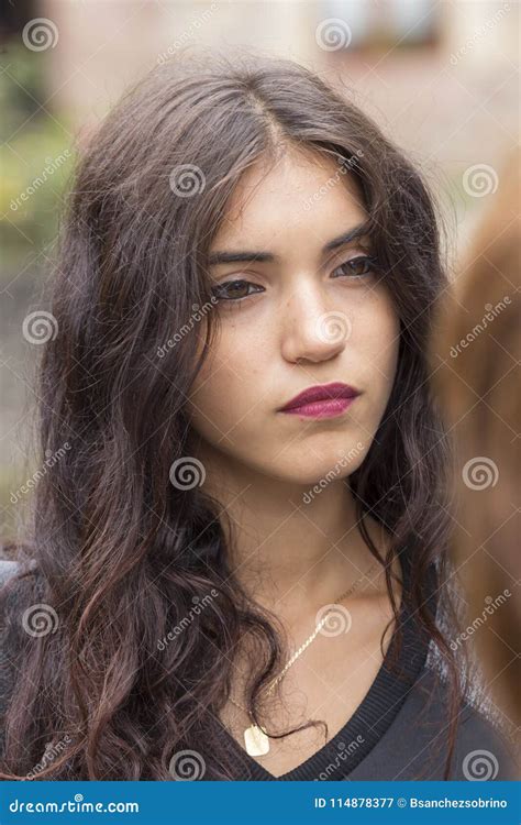 Portrait Of Brunette Girl With Distracted Look Stock Image Image Of