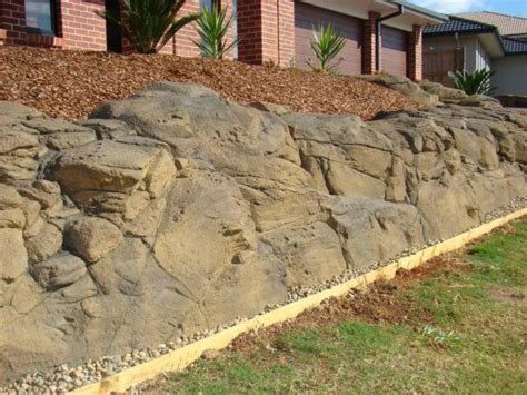 Faux rock | Rock retaining wall, Backyard plan, Faux rock