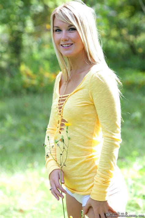 Private Jewel Showing Her Shaved Pussy In A Sunny Field 15 Photos