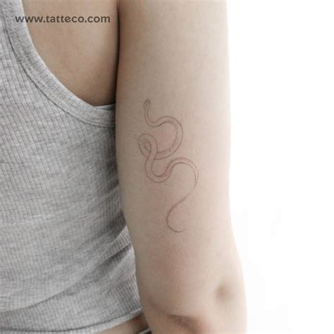 FIne line snake temporary tattoo by Harmlessberry.