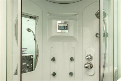 Premium Photo | Shower cabin with radio and pressurized water jets