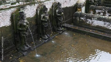 Bathing Temple Figures At Goa Gajah Elephant Cave Tourist Destination