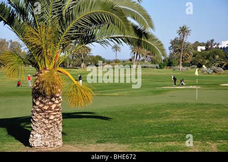 Golfers on El Kantaoui Golf Course fairway, Port El Kantaoui, Sousse Governorate, Tunisia Stock ...