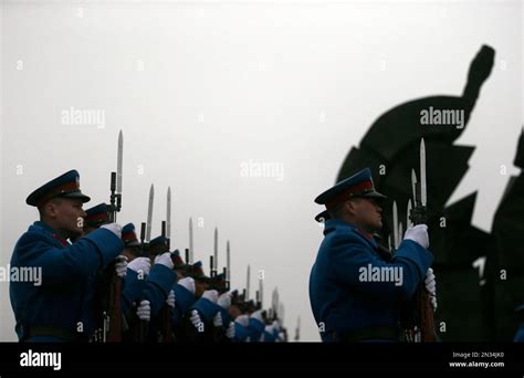 A Serbian Military Honor Guard Pay Homage To The Victims Of The