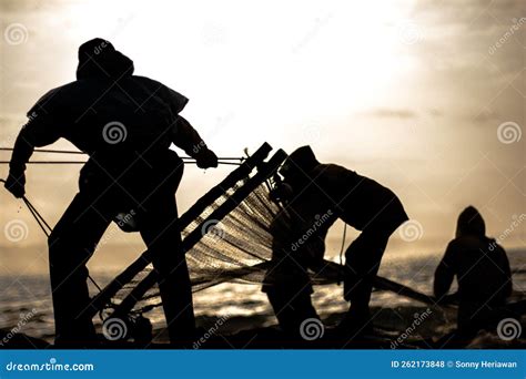 Group Of Fishermen Pulling Their Net Stock Photo Image Of Interaction