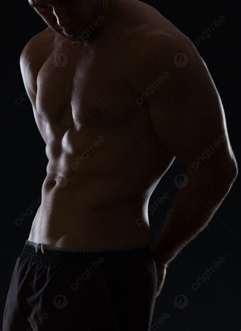 Closeup On Male Athlete Showing Muscular Body On Black Photo Background ...