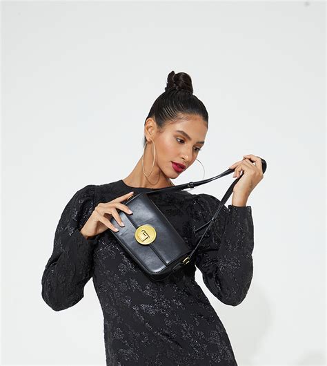 Buy Tyra Metal Accent Flap Crossbody In Black Thstreet Uae